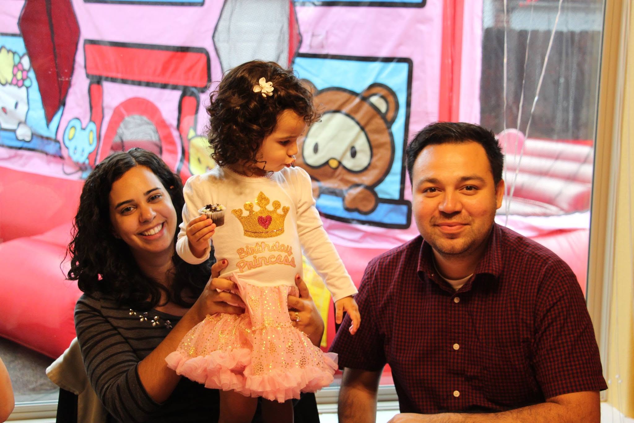 Founder Robert and Maria De Los Santos with their daughter at a Sky High Party Rentals event